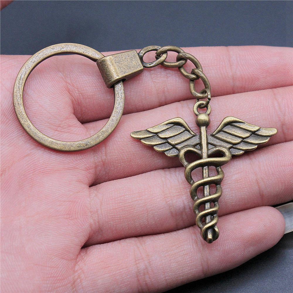 Dinosaur Animal Prehistoric Creature Pendant Antique Bronze Metal Keychain with 30mm Ring for Women High Quality