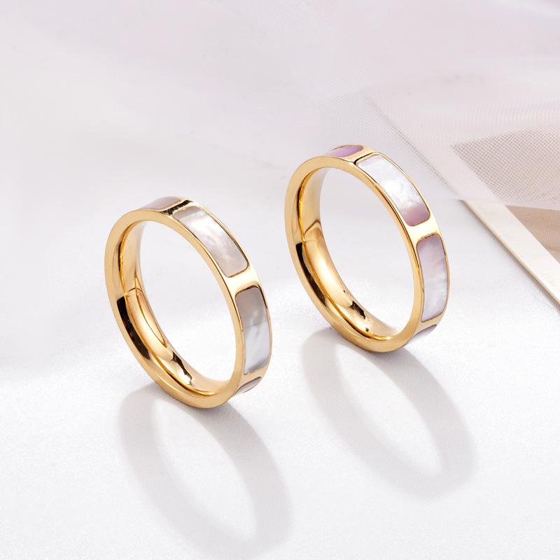 

Европейское и американское женское кольцо из белого перламутра - Легкая роскошь, покрытие из 14-каратного золота, титановая сталь Size 9 ярко-розовый/золотой