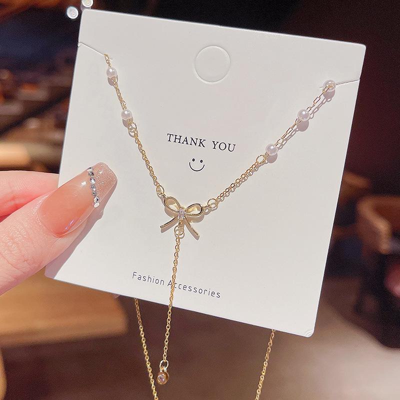 High-End Titanium Steel Bow Tassel Necklace: Elegant, Super Fairy Fashion for Women, Trendy Clavicle Chain