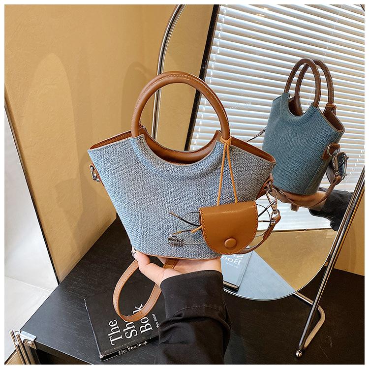 

Сегодняшние популярные сумки женские новые летние модные нишевые сумки-мессенджеры сумки-ведра синий