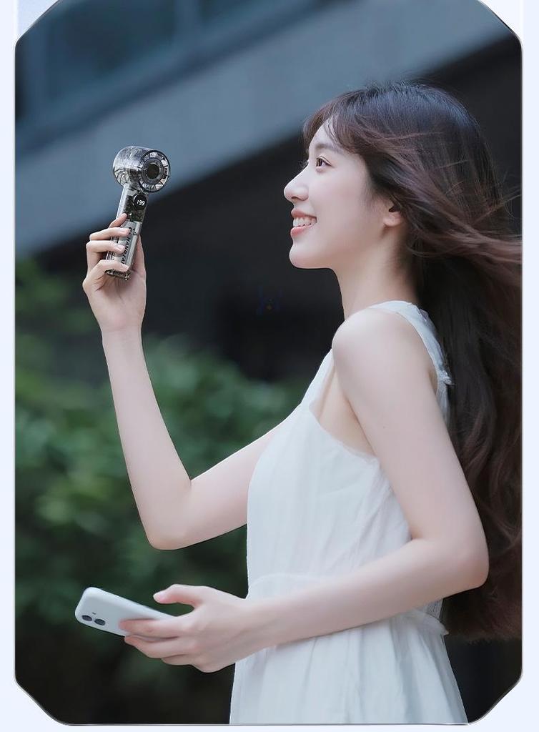 High-Speed Handheld Mini Air Cannon Fan for Students, Babies, and Gift-Giving - Portable for Blowing Food and Eyelashes.