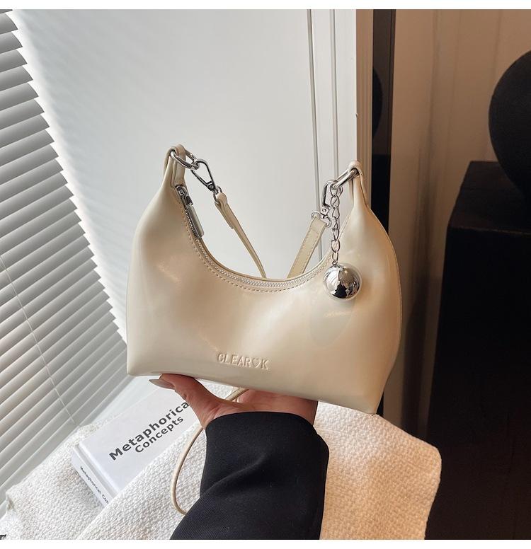 

Niche bags women s spring and summer new fashion messenger bags women s high-end portable dumpling bags бежевый