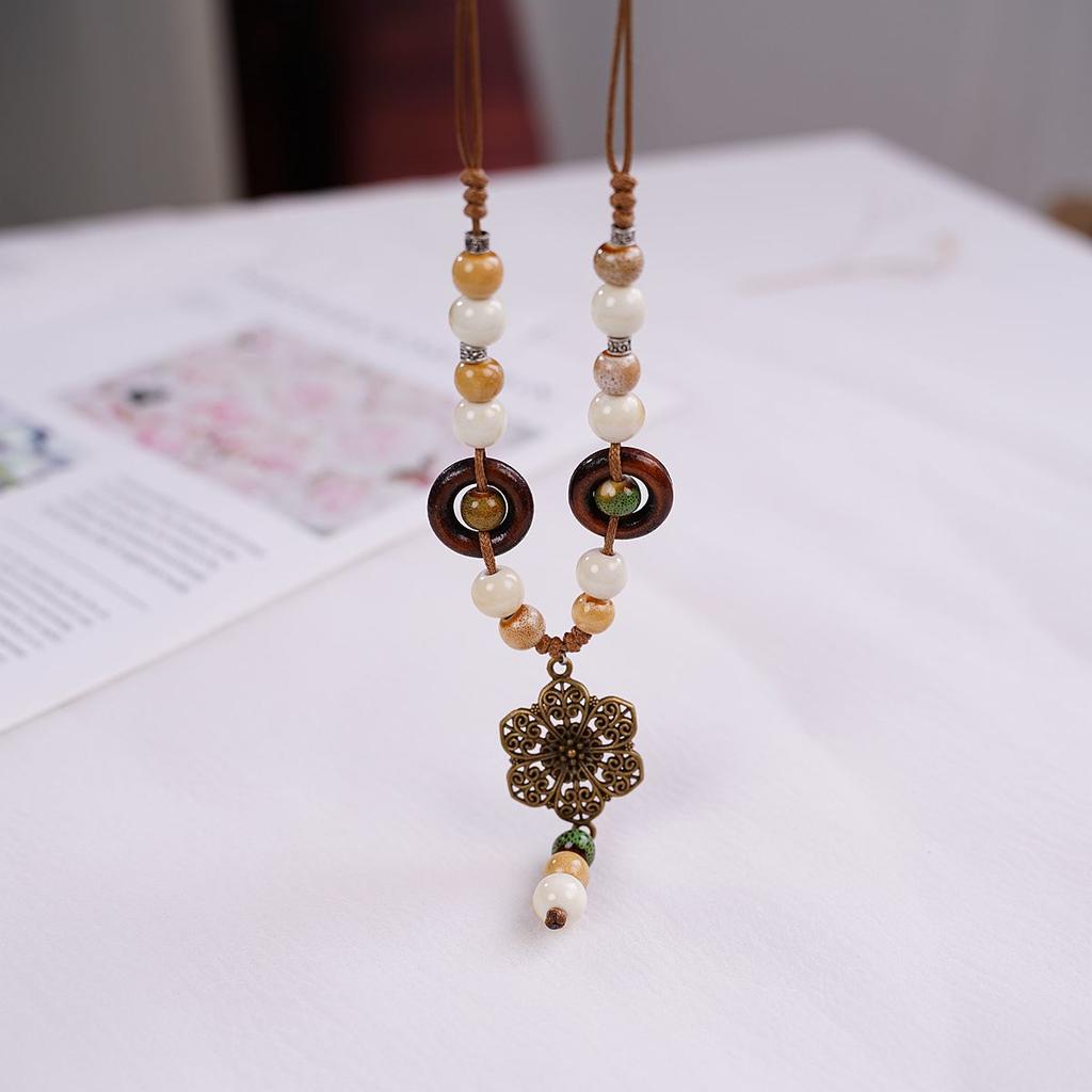Factory direct sales ceramic necklace does not fade light luxury niche sweater necklace