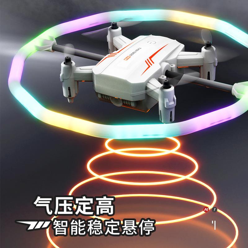 Dron akrobacyjny z kolorowymi światłami, przewracający się, obracający, czterowirnikowy, ze stałą wysokością utrzymywaną przez ciśnienie powietrza, samolot zdalnie sterowany