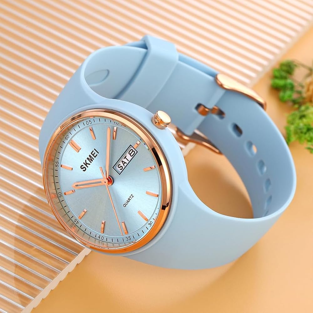 SKMEI Women's Casual Silicone Waterproof Sports Watch Light Blue Simple Design with Date and Day Display