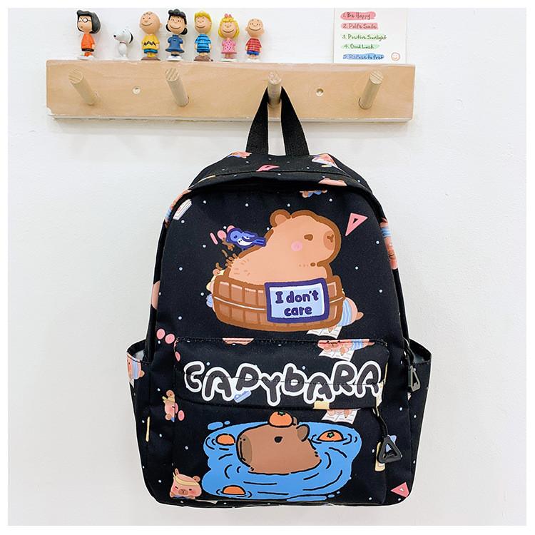 Cute Girl Backpack Featuring Cartoon Capybara Pattern And Ergonomic Shoulder Straps For Elementary Students