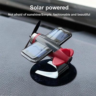 Decorazione per auto Aromaterapia Decorazione per aeromobili Tappetino antiscivolo in lega Solar Rotary Cruscotto per aeromobili Modellazione di auto
