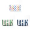 Modern Pvc Cosmetic Bag With Striped Design For Travel And Daily Use