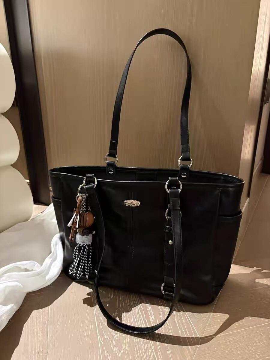 

Nanfeng versatile trend Qiyu Milan tote bag super A black leather bag large-capacity handbag women s commuter shoulder bag чорний