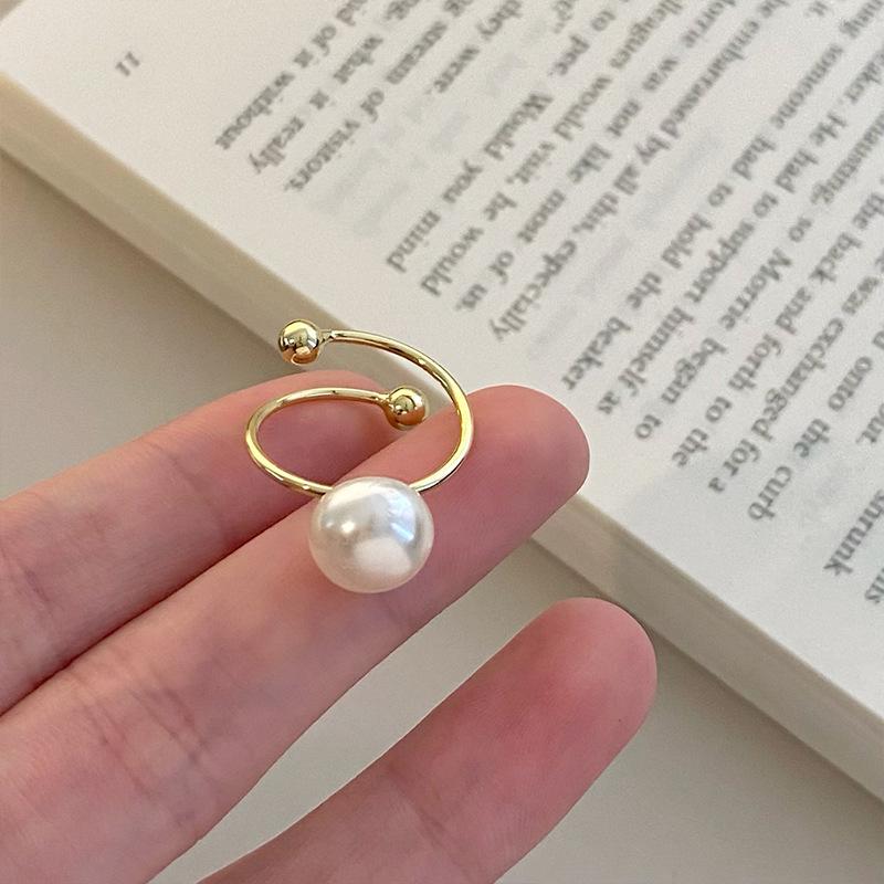 

Минималистичное кольцо с неправильным жемчугом, регулируемое