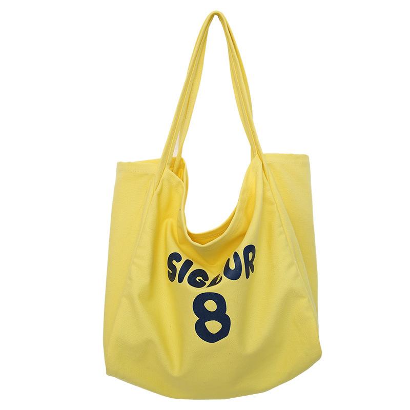 Spring and summer new printed canvas bag women's niche design large-capacity shoulder bag lazy atmosphere tote bag