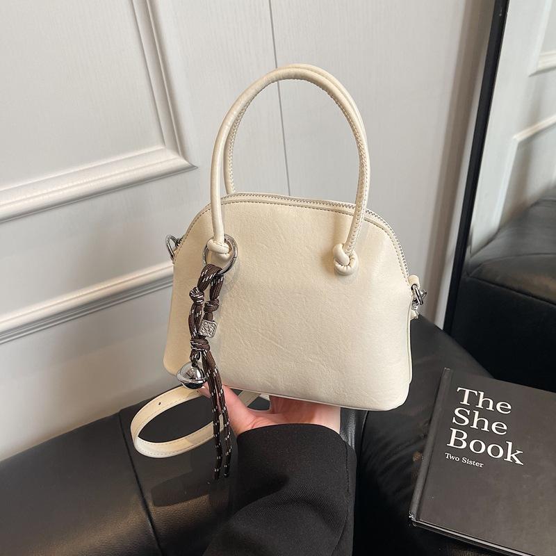 Niche light luxury portable shell bag women's new high-end retro fashion shoulder messenger bag