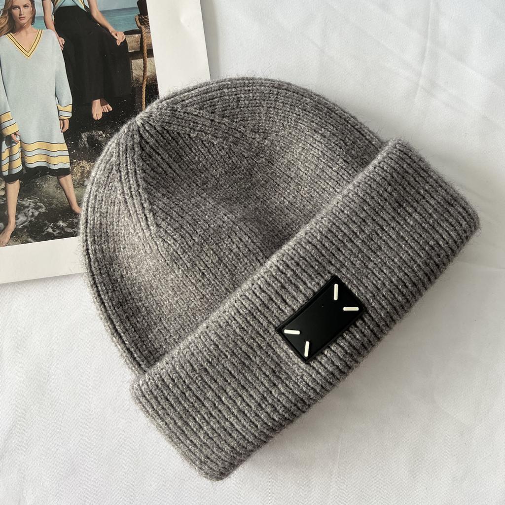 Winter new thick wool knitted hat warm versatile bag head hat flanged ear protection fashion wool hat women's cold hat