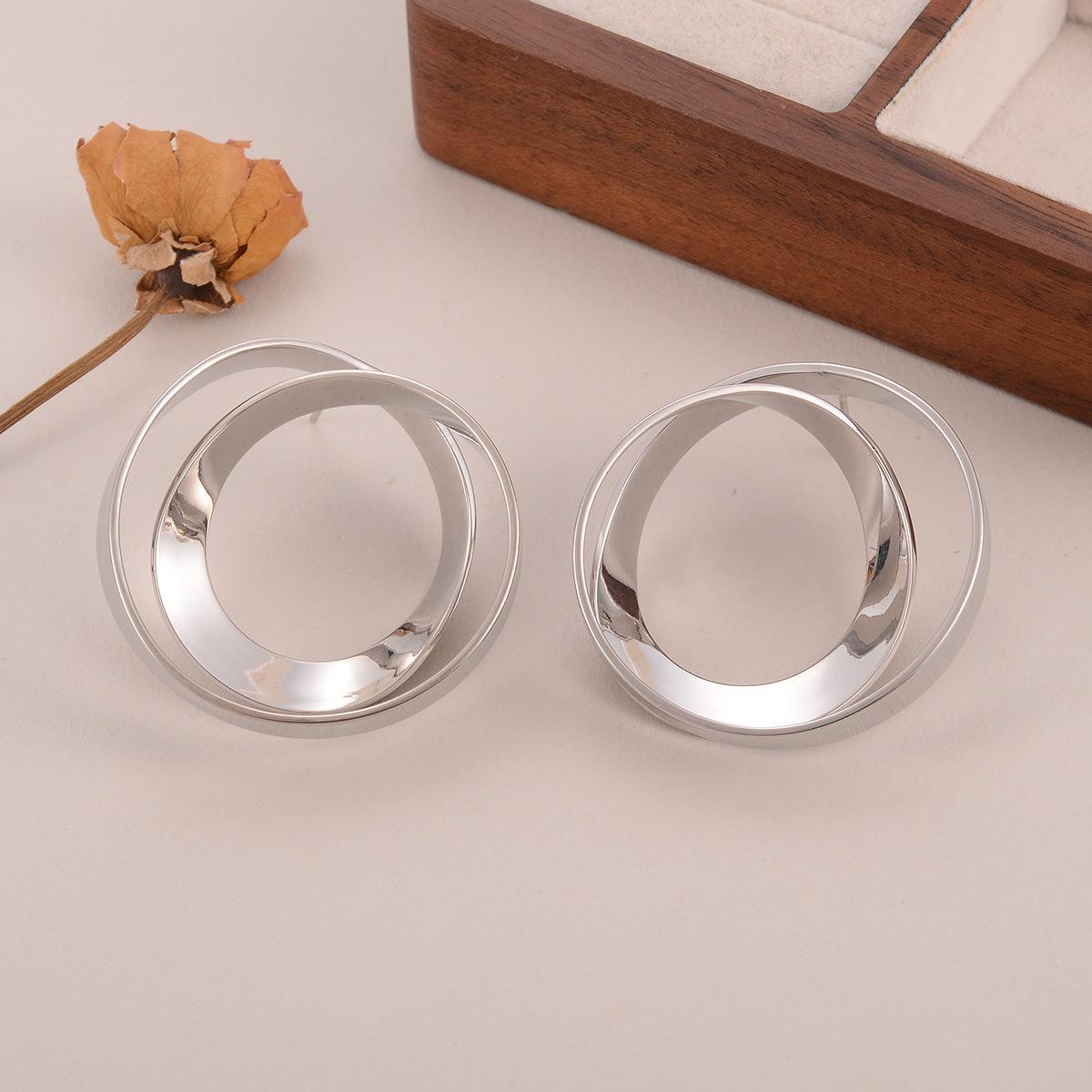 

Metal French Spiral Silver Needle Earrings Temperament Geometric Mosquito Coil Disk Earrings Simple and Fashion Versatile Earrings Jewelry Women