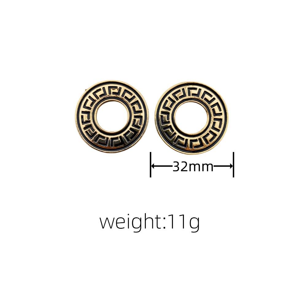 Übertriebene runde Hohlohrringe aus Legierung mit personalisierten Schnitzmustern. Ohrringe für Frauen