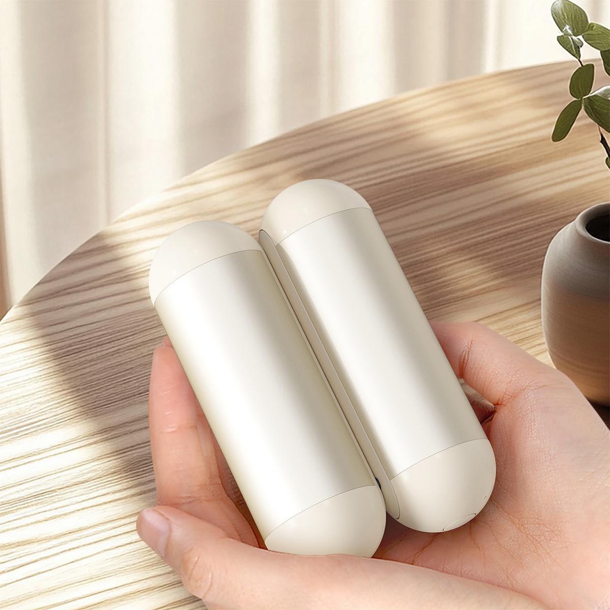 

Two-in-one magnetic hand warmer, USB portable hand warmer, detachable pocket heater, ideal tech gift for everyday outdoor use. слоновая кость