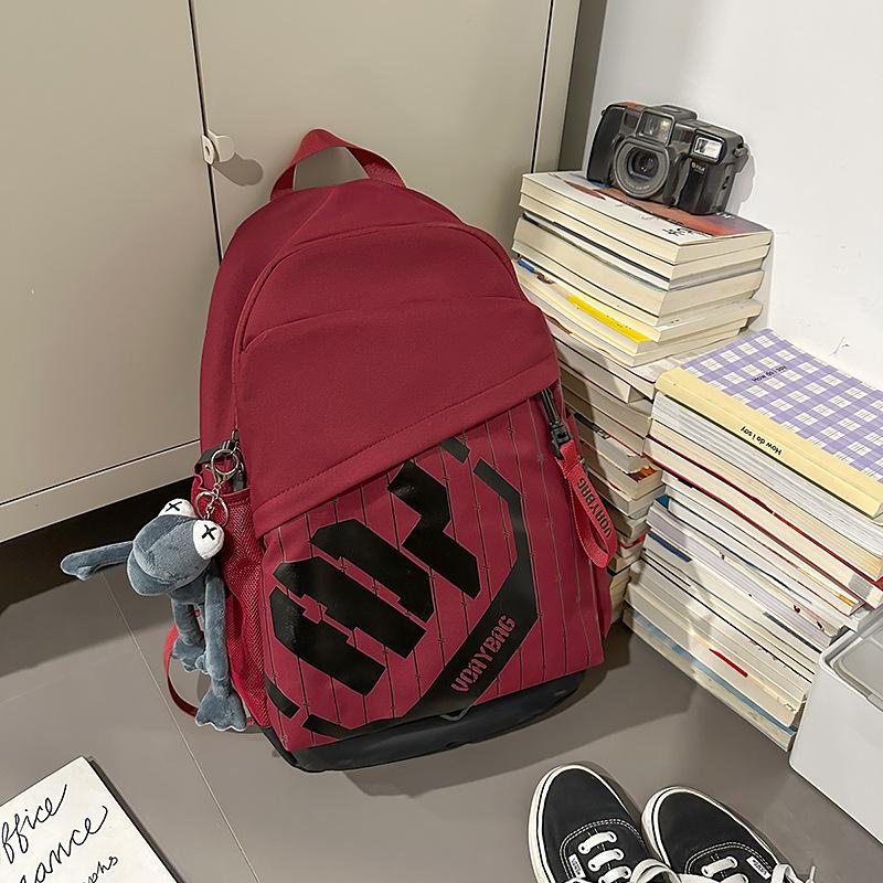 College student schoolbag is simple and large-capacity, junior high school student travel backpack, trendy and casual backpack, student schoolbag.