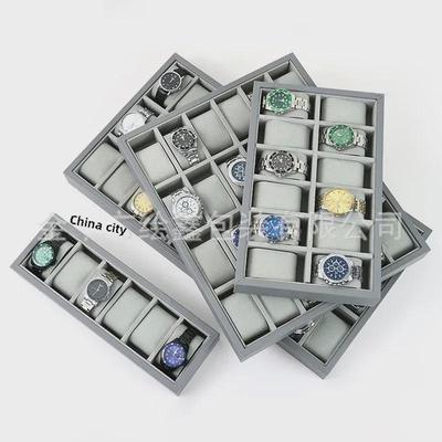 Gray Watch Display Tray: Ideal for Showcasing & Broadcasting Famous Watches