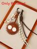 Leather Keychain With Cartoon Coal Ball Pendant For Fashionable Car And Bag Accessories