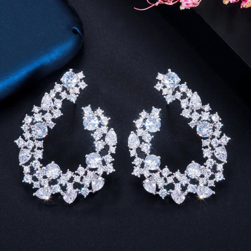 

Серьги-гвоздики WWJ высшего качества с кубическим цирконием серебряного цвета в форме листа белый