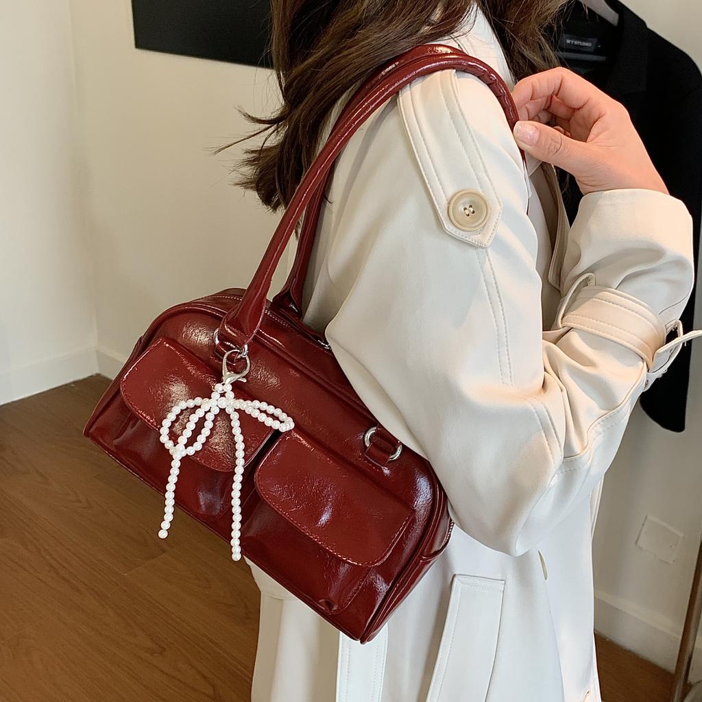 Simple and casual bow tie armpit bag for ladies, new Korean versi for 2026; fashiable and versatile single shoulder bag.