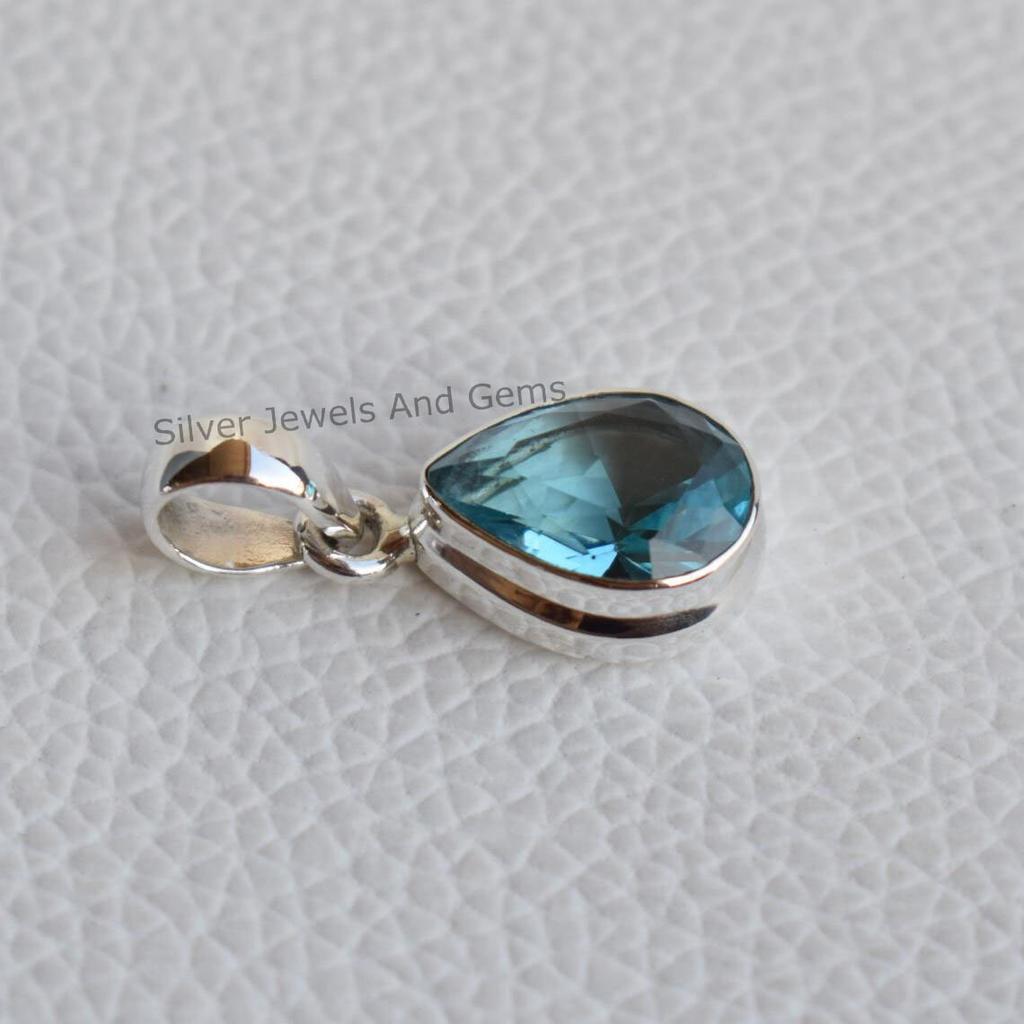 Handmade Teardrop Blue Topaz Pendant: 925 Sterling Silver