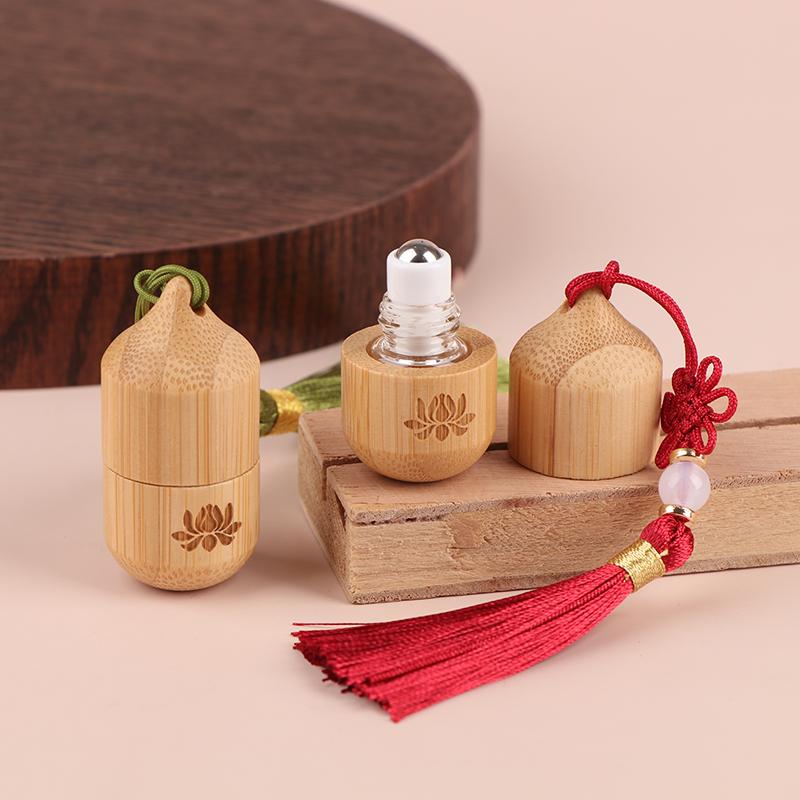 1 ml Bambusroller Leere Flasche Hautpflegebehälter Antiker Stil Roll-on-Flaschen Kleine Parfüm Ätherisches Öl Mit Anhänger