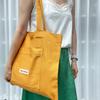 SHOPPER POCKET BAG [MUSTARD]