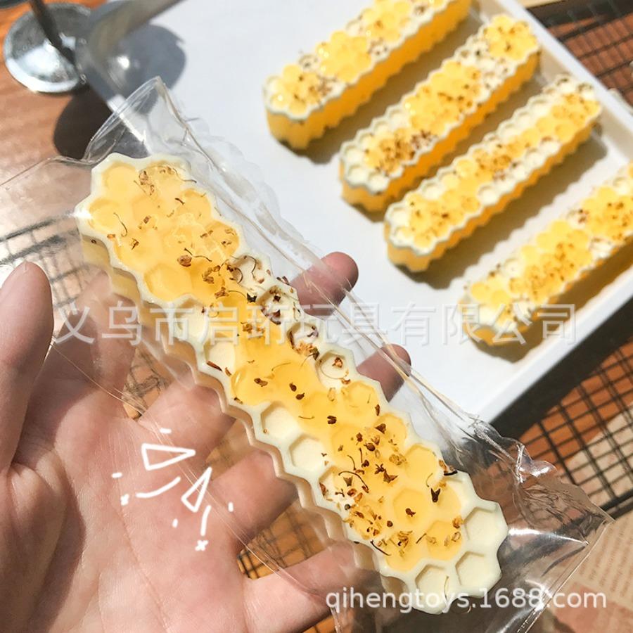 Decompression artifact simulation honey strip pinch music, honeycomb honey schoolbag pendant toy imitation silicone ornament toy