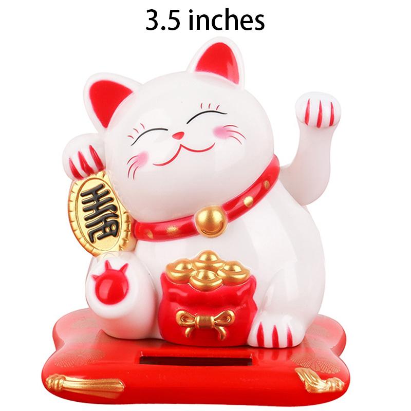 Solarbetriebene Maneki Neko winkt ihre Arme zu Lucky Cat, einer 3,5" Glückskatze, die Weihnachtsdekorationen für das Homeoffice herstellt.