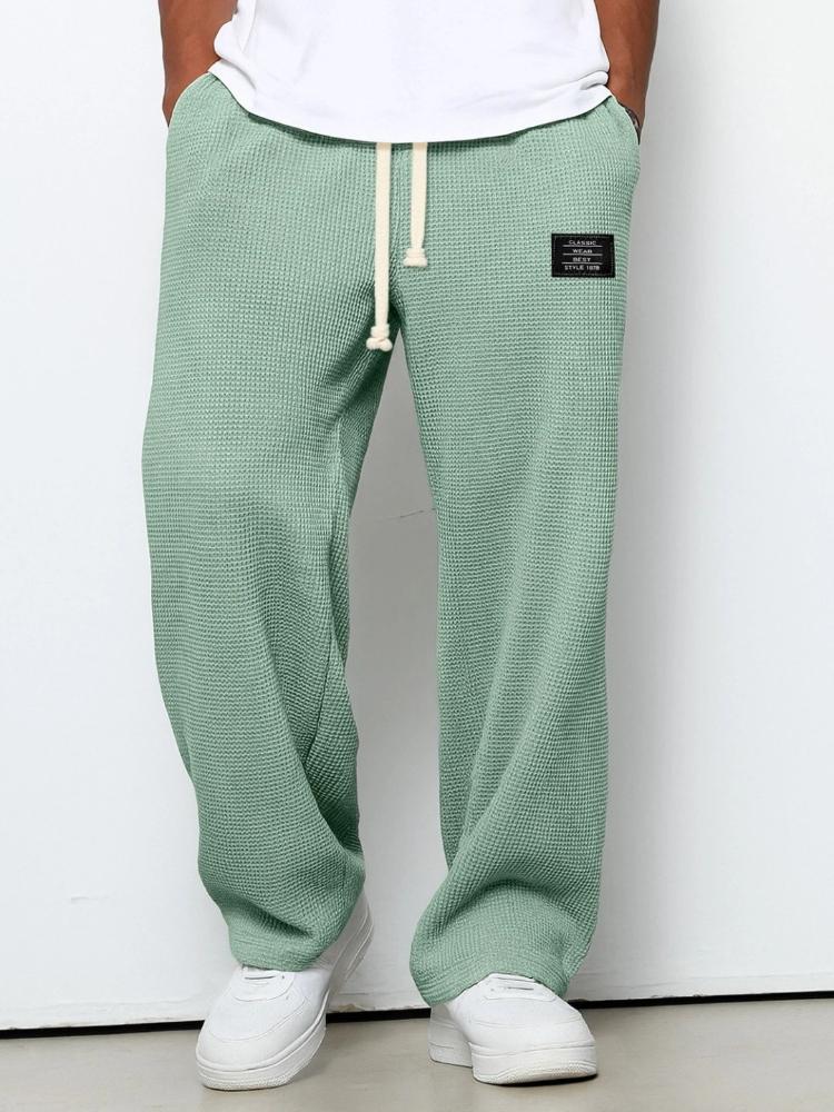 Pantaloni della tuta casual sportivi a gamba dritta in maglia waffle con elastico e coulisse a vita media