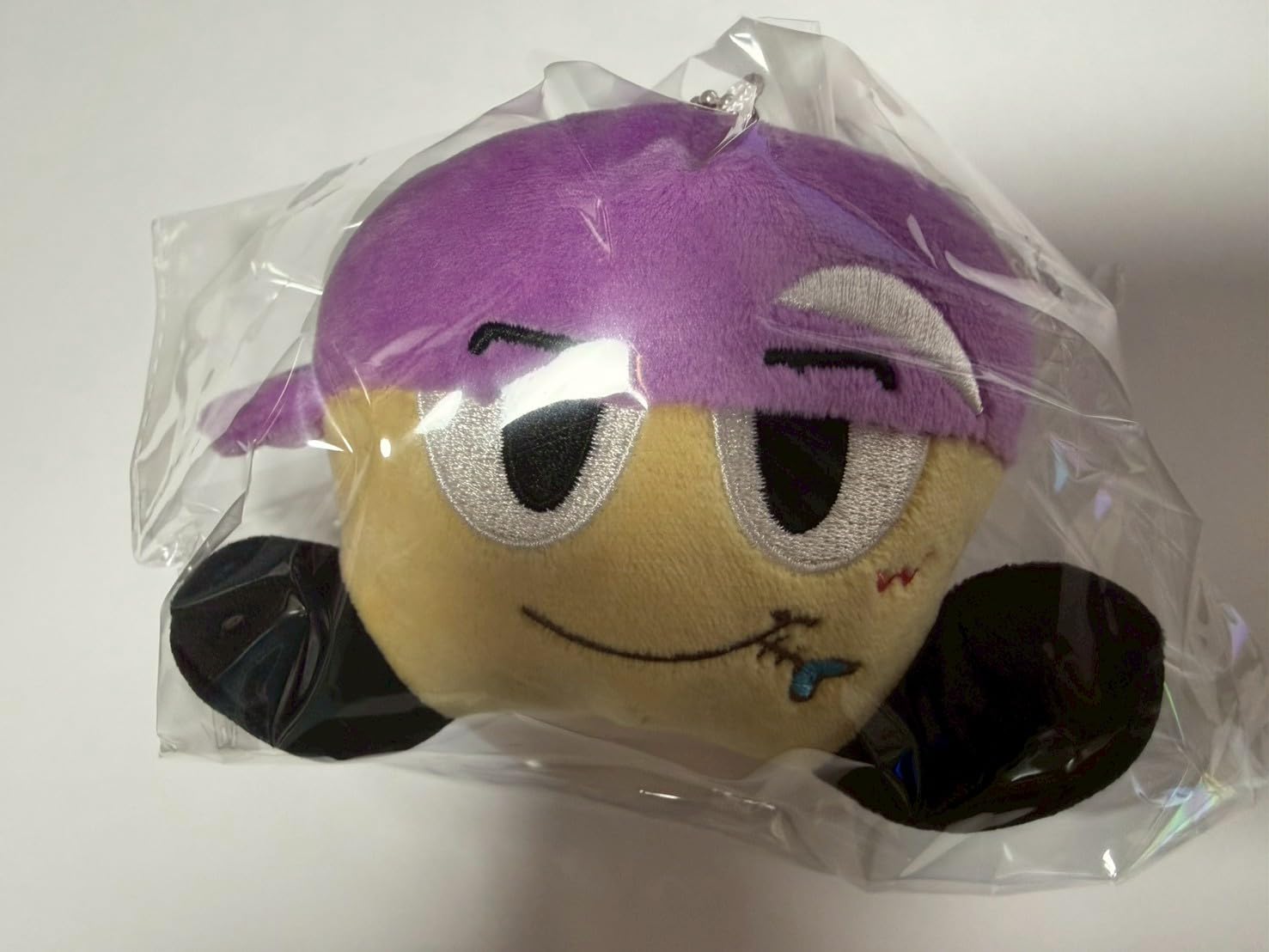 

Hanging stuffed toy by Takahiro Hamada Purple stuffed toy WEST.