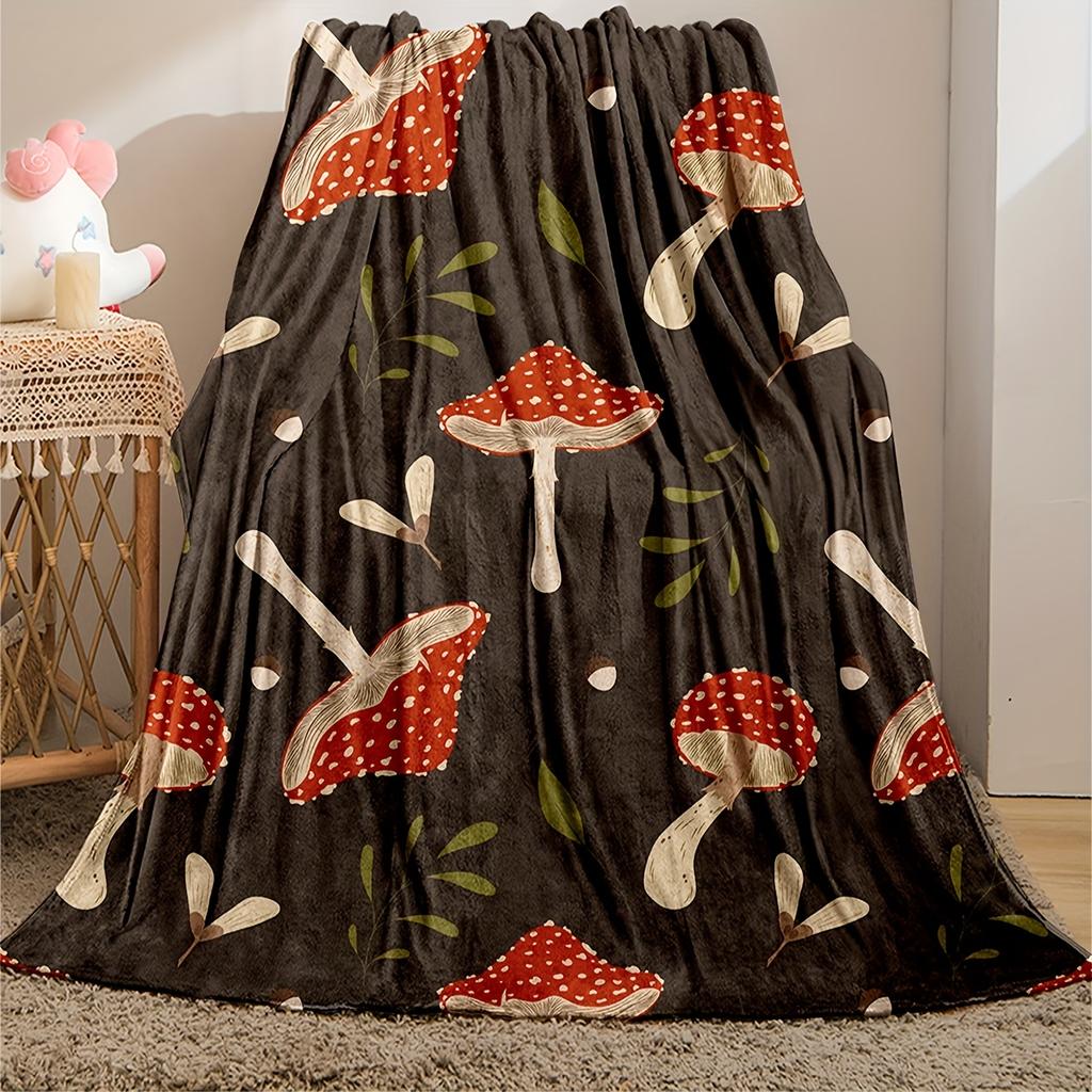 Flannel Mushroom Design Blanket with Red Spotted Mushrooms and Green Leaf Details for Warm Home Decor & Relaxing Living Comfort