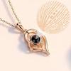 Ti amo in 100 lingue Collana con proiezione a cuore cavo intarsiato con strass