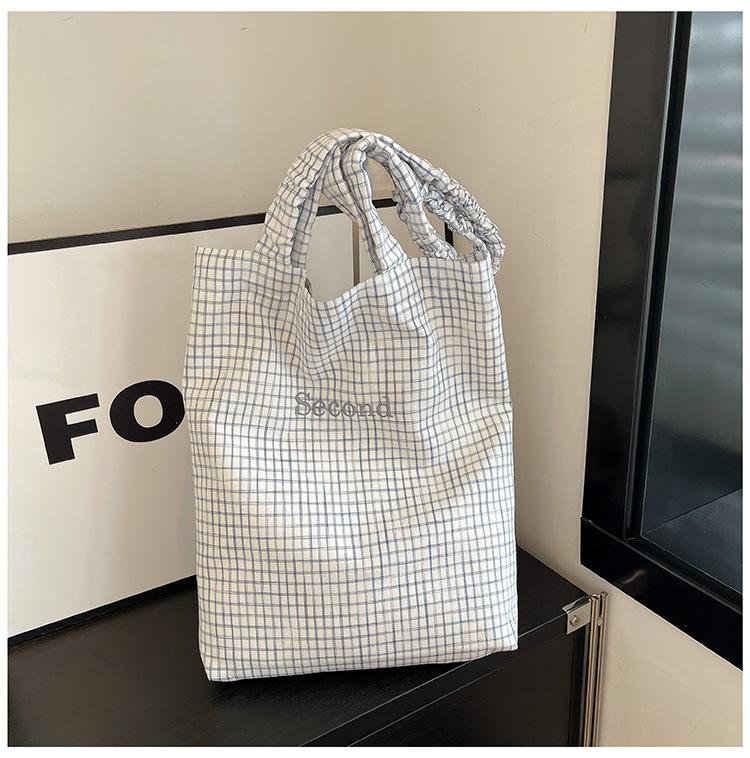 

Small plaid cloth bag women s summer light and versatile large-capacity student shoulder bag niche literary tote bag білий