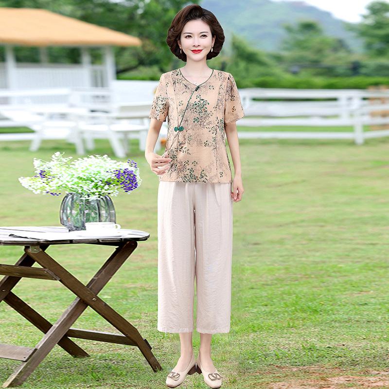 

Летняя мода 2025 года: Комплект женской одежды для мамы: футболка с коротким рукавом и стильная блузка с принтом для женщин среднего и пожилого возраста 2XL зелёный