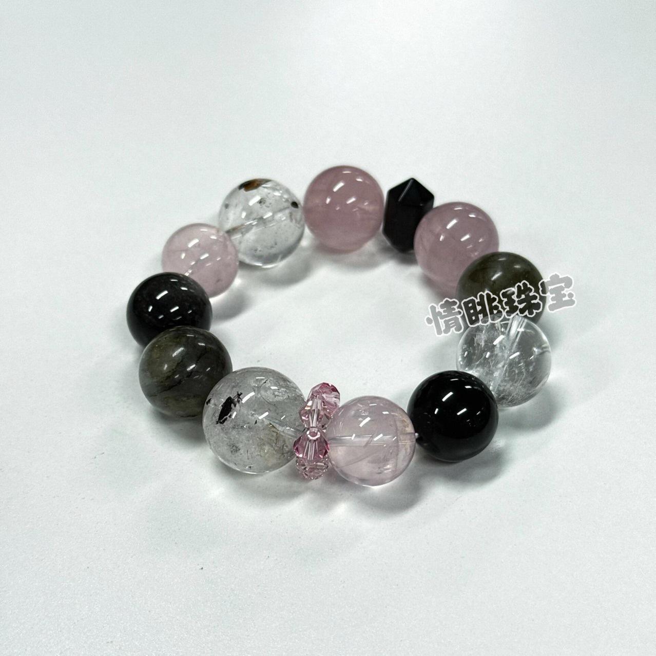 

Оригінальний браслет з чорного обсидіану «Чорний Фантом» та рожевого кварцу з натуральними кристалічними намистинами