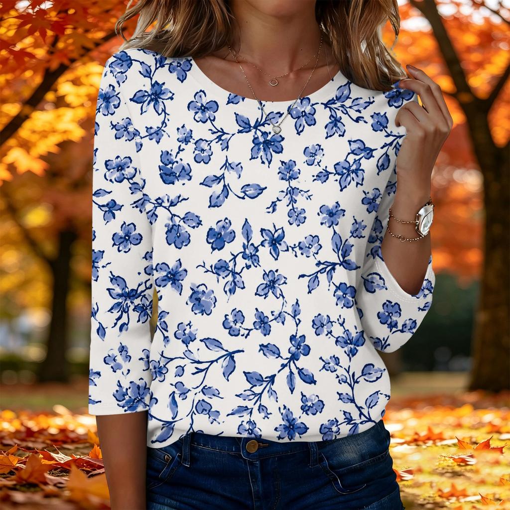 Top da donna casual alla moda a maniche a tre quarti con stampa floreale e girocollo