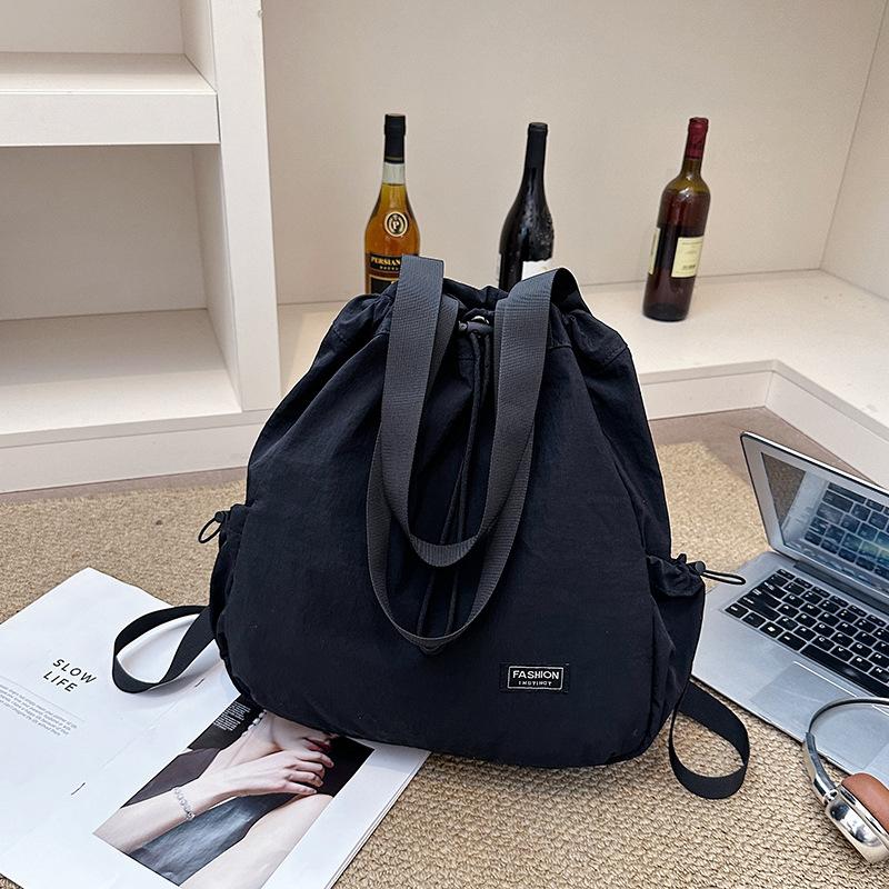 Schoolbag Large Capacity Drawstring Backpack Women's 1011 New Travel Outdoor Handheld Shoulder Bag Lazy Wind Tote Bag