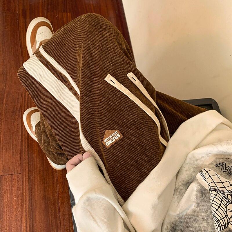 Luźne spodnie dresowe w paski dla mężczyzn spodnie z prostymi nogawkami moda hiphopowy sweter spodnie Harajuku Casual dna Y2K męskie ubrania