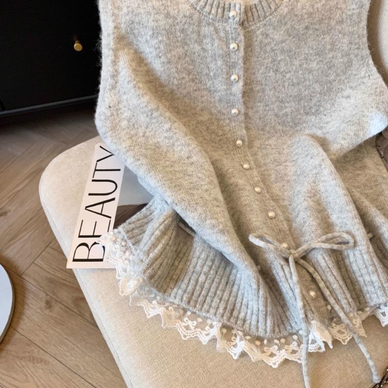 light grey round neck pearl button knit vest with lace trim and drawstring for women