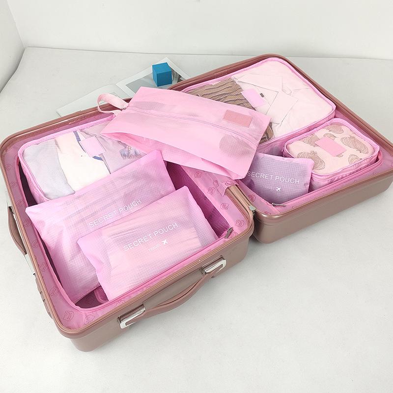 Seven-Piece Travel Luggage Set with Clothing and Shoe Storage Bags