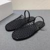 Französische Retro-Hohlfischernetz-Oberfläche gewebte Tasche Kopfsandalen Damen 2025 neue flache Sohle bequeme lässige Hausschuhe Außenschuhe