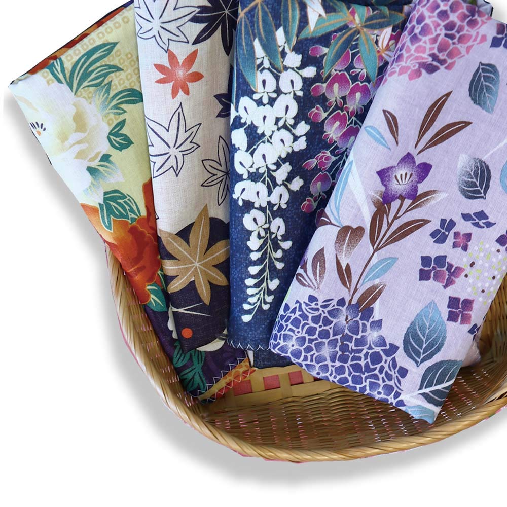 

A soft and fluffy tenugui towel made with gauze featuring designs on both sides from a Kyoto Japanese goods manufacturer of triple-layered (set 4).