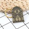 Retro Bronze Turin Gate Keychain: Movie-Inspired Backpack Pendant & Collectible Ornament