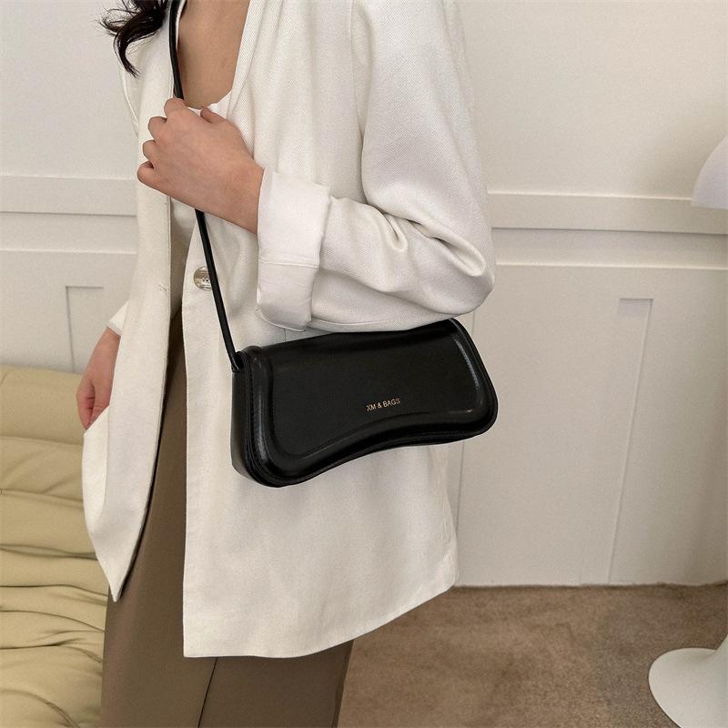 Textured solid color retro bag women's bag 2025 summer new casual messenger bag simple shoulder armpit bag