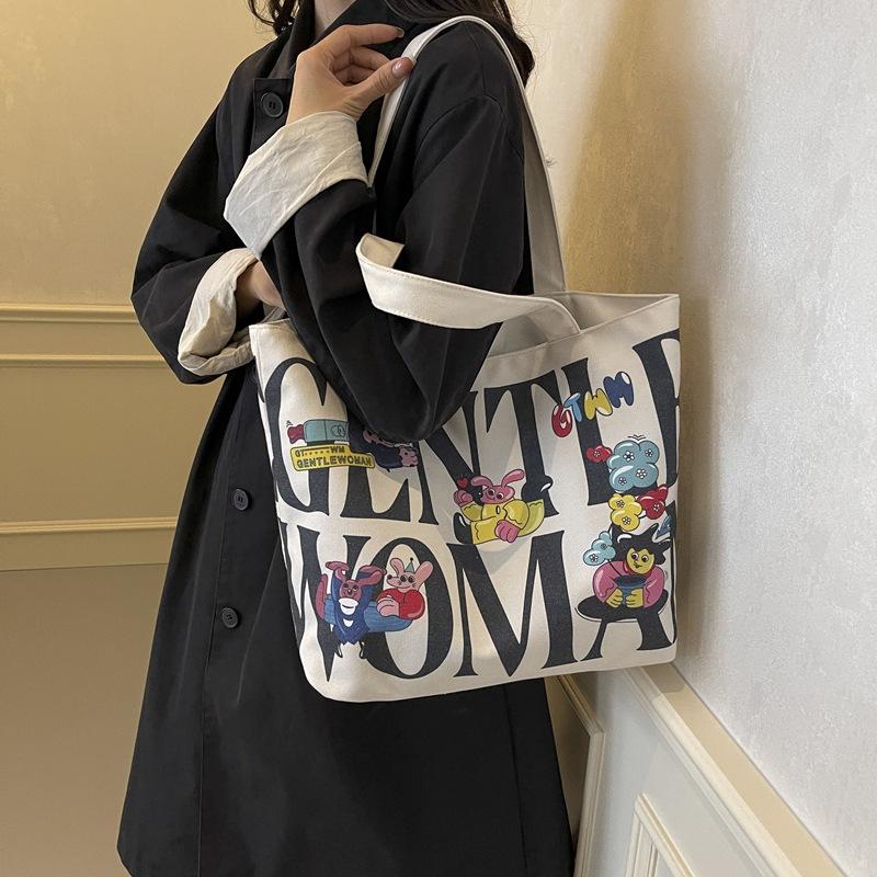 Fashion Korean version handbag casual commuter shoulder bag women's big bag ins new women's alphabet canvas tote bag