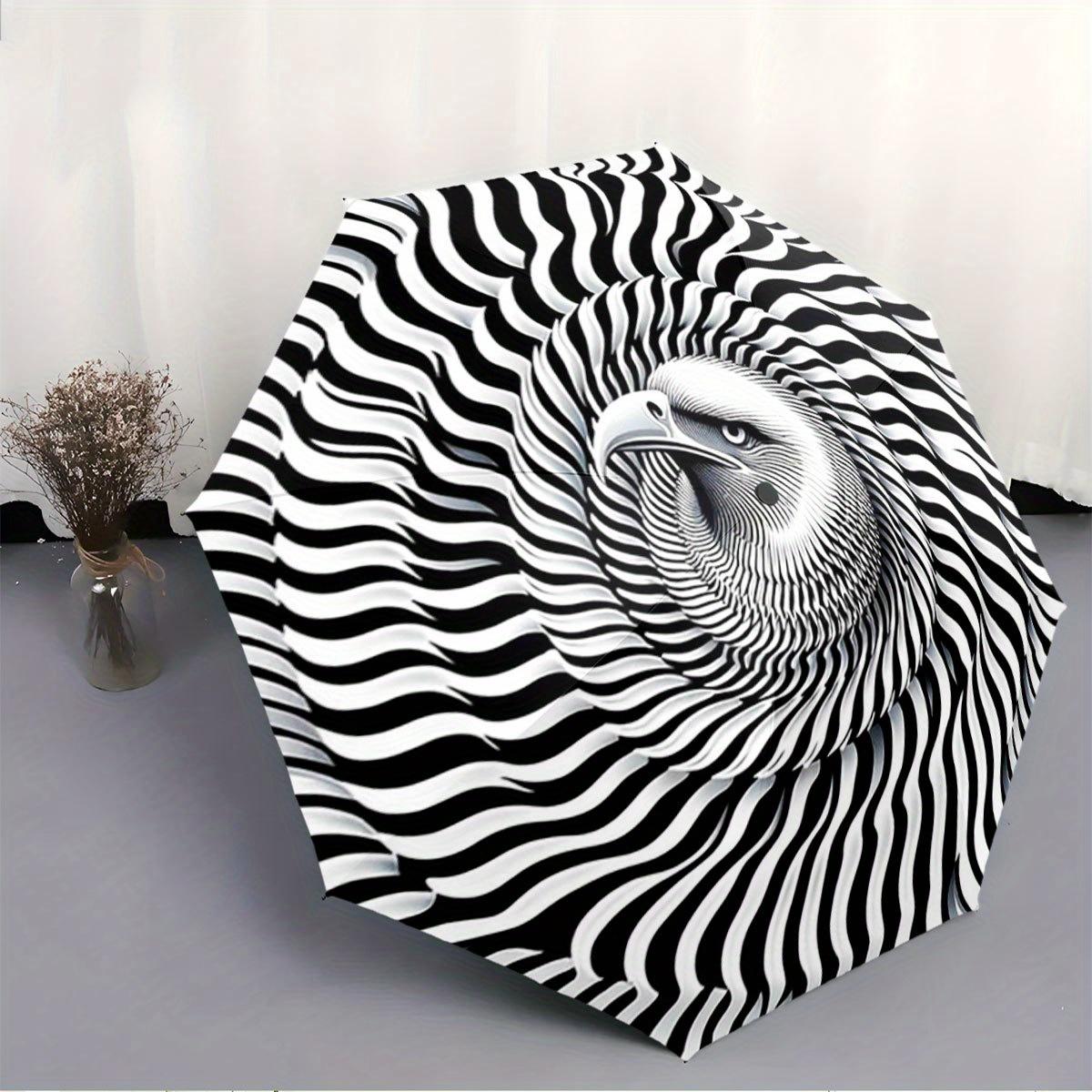 

Folding Umbrella The umbrella features a black and white spiral pattern with the image of an eagle at its center. Fits Travel, Iron&8K