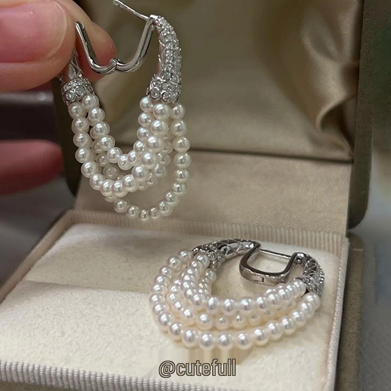 Zirkon Perlmutt Sunburst Ohrklemmen: Elegante, vielseitige Ohrringe für Frauen.