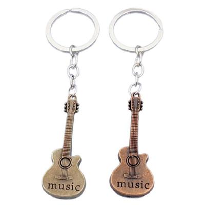 Fashionable Guitar Keychain Trendy Music Guitar Key Ornament for Girls and Women Add Charm To Everyday Accessories